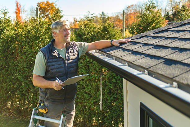 Professional Roofing technician working in Belle Plaine, IA